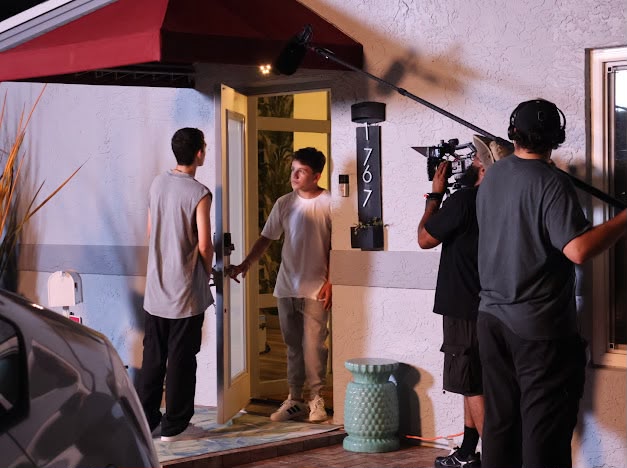 Night doorway scene for &ldquo;Brothers&rdquo; with camera and boom operators